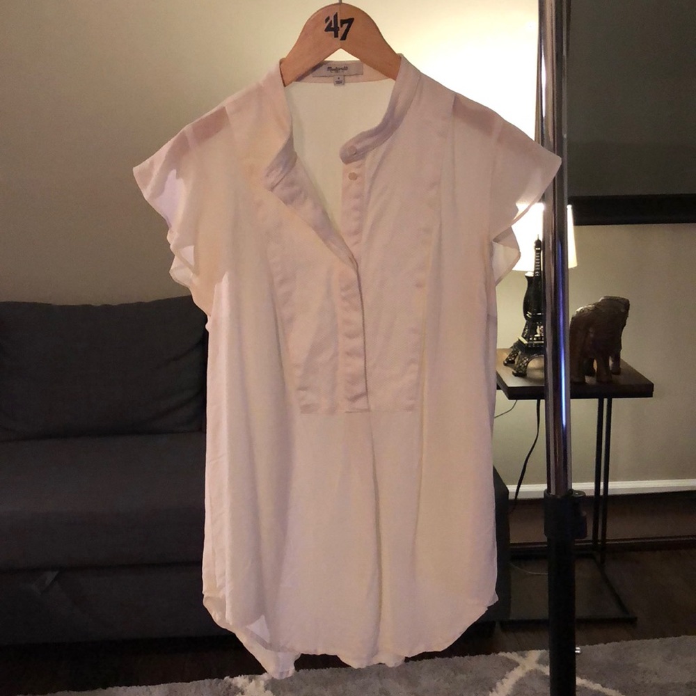White ruffle cap sleeve shirt